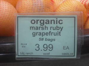 Rainbow Grocery labels the state or country of origin of all of its produce, and the town if it's from California. These grapefruit are from Oasis, a small town in Southern California.