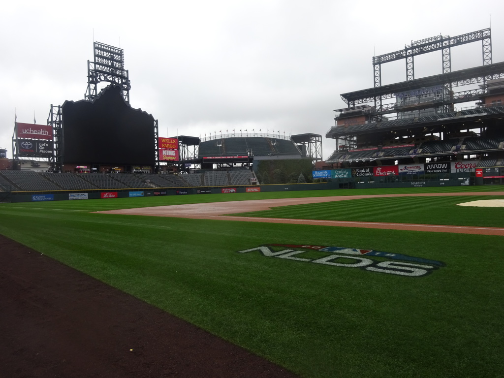 Coors Field, on my tour of the stadium the day after the Colorado Rockies were eliminated from the playoffs. Writing hawking the NLDS series has yet to be removed from the third base lin.